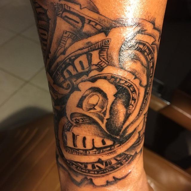 Black and grey forearm piece