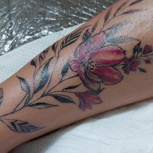 Floral forearm tattoo